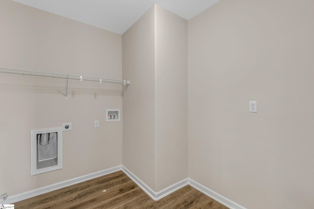 washroom featuring hookup for a washing machine, hookup for an electric dryer, laundry area, wood finished floors, and baseboards