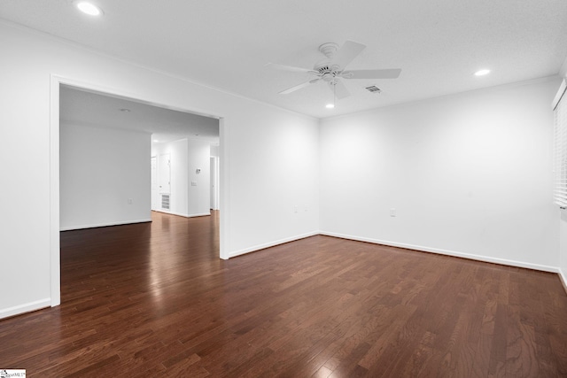 spare room with ceiling fan, baseboards, wood finished floors, and recessed lighting