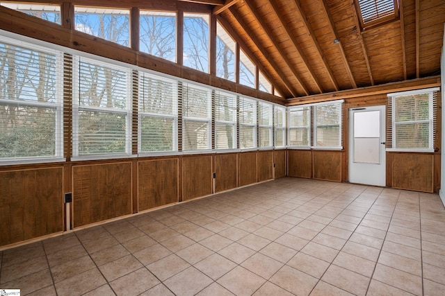 unfurnished sunroom with wooden ceiling and vaulted ceiling with beams