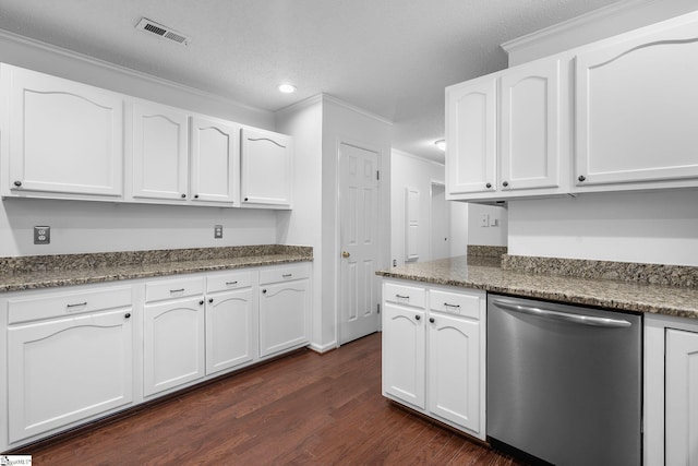 kitchen with crown molding, visible vents, dishwasher, and white cabinetry