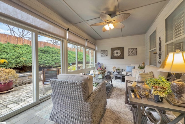 sunroom / solarium with ceiling fan