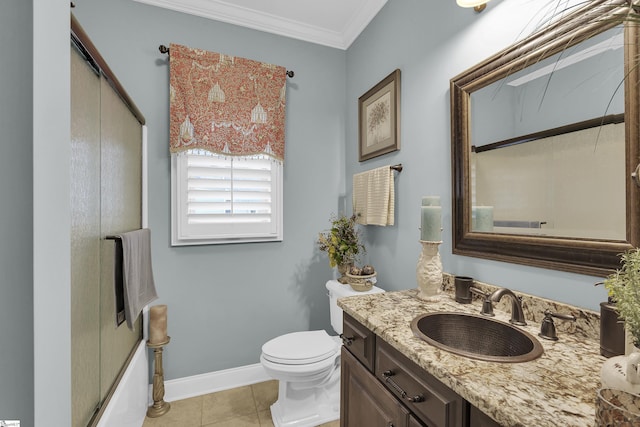 full bath featuring tile patterned flooring, toilet, vanity, baseboards, and crown molding