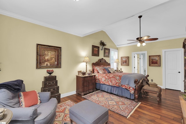 bedroom with lofted ceiling, dark wood-style flooring, crown molding, and baseboards