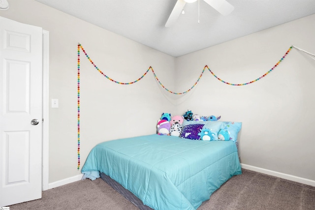 bedroom with carpet floors, a ceiling fan, and baseboards