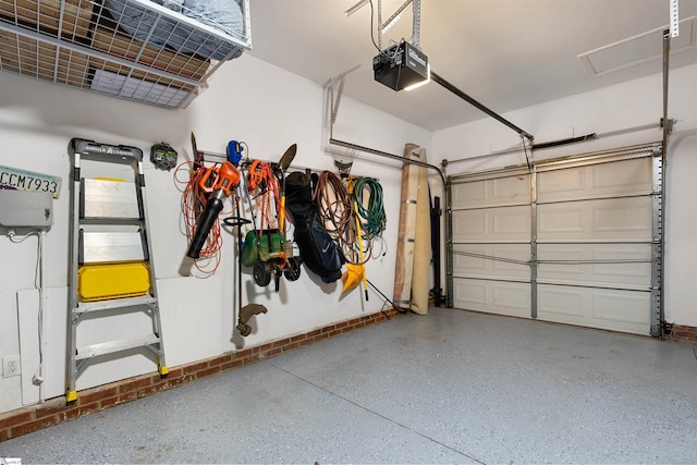 garage featuring a garage door opener