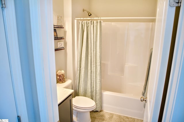 full bathroom featuring toilet, tile patterned flooring, shower / tub combo with curtain, and vanity