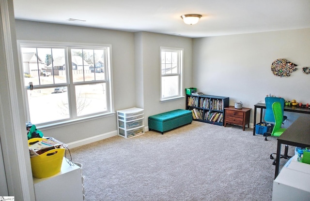 rec room featuring carpet flooring, visible vents, and baseboards