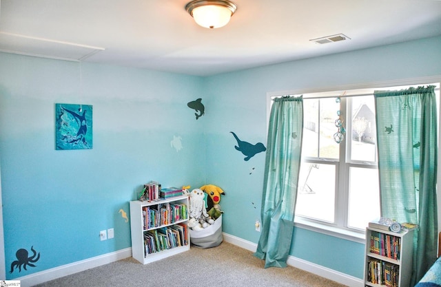 game room featuring carpet, attic access, visible vents, and baseboards