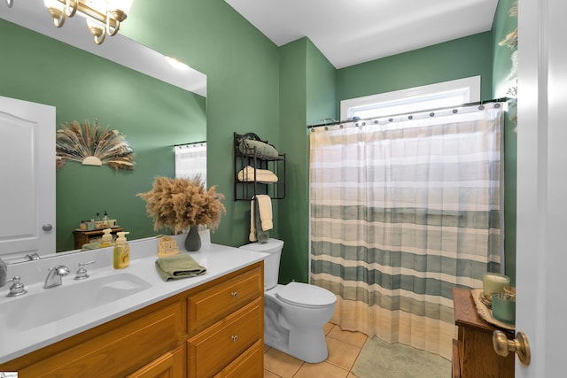 full bathroom with toilet, a shower with curtain, vanity, and tile patterned floors