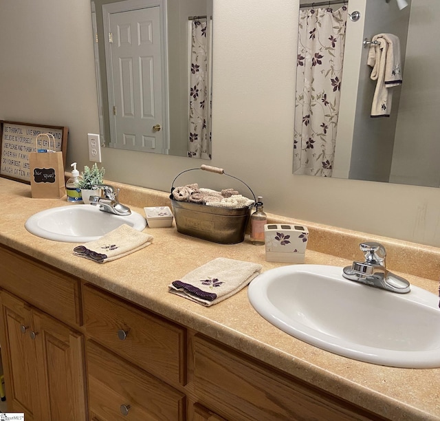 bathroom with double vanity and a sink