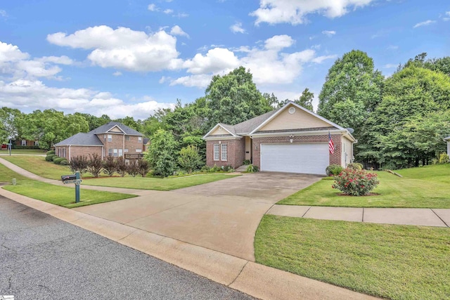 view of front of property with a front yard, concrete driveway, brick siding, and an attached garage