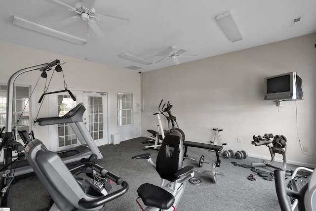 exercise area with ceiling fan, visible vents, and baseboards