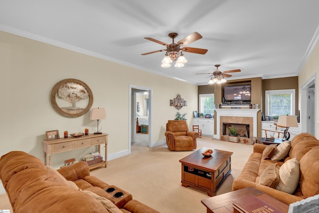 living room featuring carpet floors, plenty of natural light, and crown molding