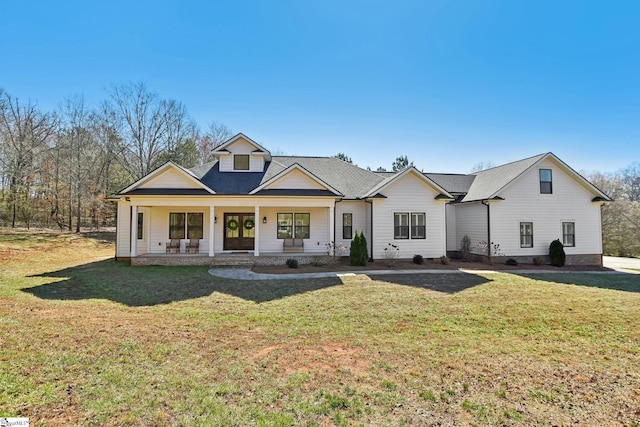 modern inspired farmhouse with a porch and a front yard