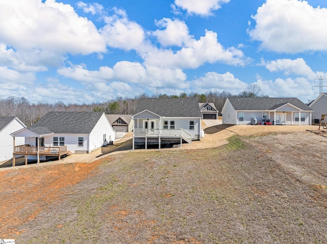 view of front of house with a wooden deck