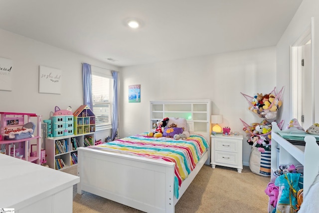 bedroom with light carpet and visible vents