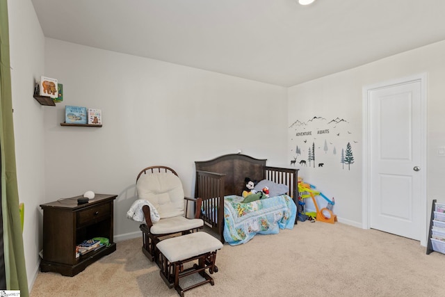 carpeted bedroom with baseboards