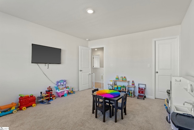 rec room with carpet floors, baseboards, and recessed lighting