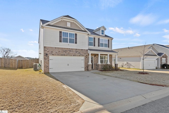 view of front of house featuring driveway, a garage, fence, central air condition unit, and brick siding