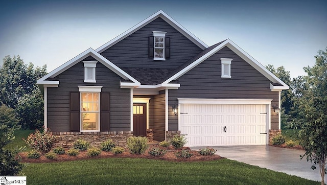 craftsman-style home featuring driveway, stone siding, an attached garage, and a front lawn