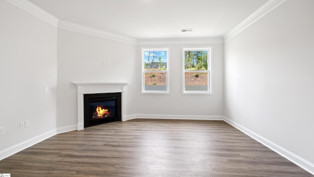 1807 Wabash Pl Lot 0507, Boiling Springs, SC 29316 - unfurnished living room featuring a glass covered fireplace, crown molding, dark wood-style flooring, and baseboards