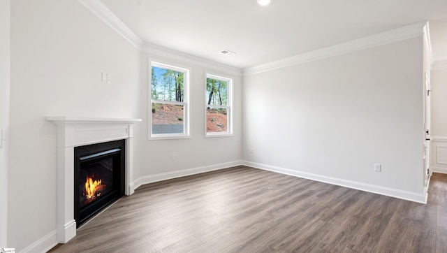 1807 Wabash Pl Lot 0507, Boiling Springs, SC 29316 - unfurnished living room featuring a warm lit fireplace, dark wood-style floors, ornamental molding, and baseboards