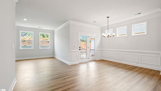 1807 Wabash Pl Lot 0507, Boiling Springs, SC 29316 - spare room featuring a chandelier, healthy amount of natural light, wood finished floors, ornamental molding, and baseboards