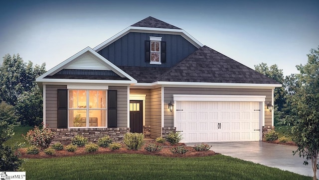 craftsman inspired home with a garage, concrete driveway, stone siding, a front lawn, and board and batten siding