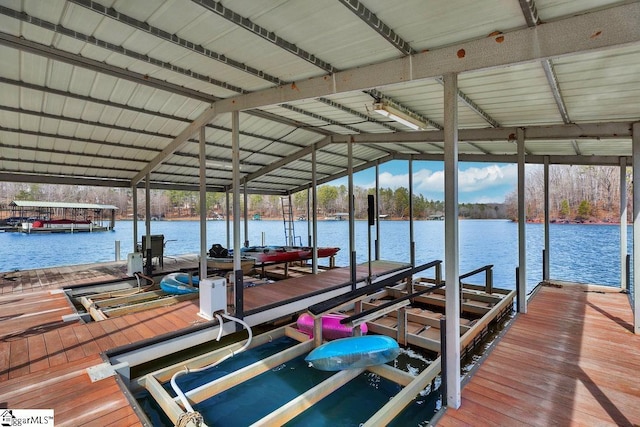 view of dock with a water view and boat lift