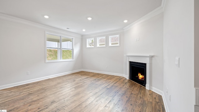 1791 Wabash Pl Lot 0511, Boiling Springs, SC 29316 - unfurnished living room with a lit fireplace, crown molding, hardwood / wood-style floors, baseboards, and recessed lighting