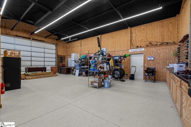 garage with wood walls