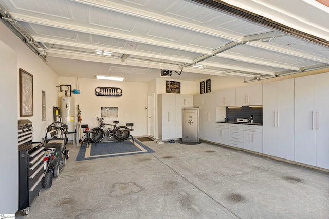 garage featuring a garage door opener and water heater