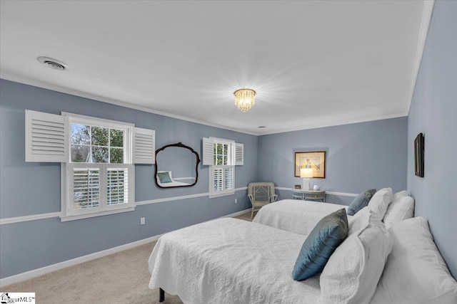 carpeted bedroom featuring crown molding, multiple windows, and baseboards