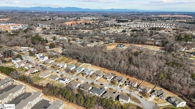 drone / aerial view with a residential view and a mountain view