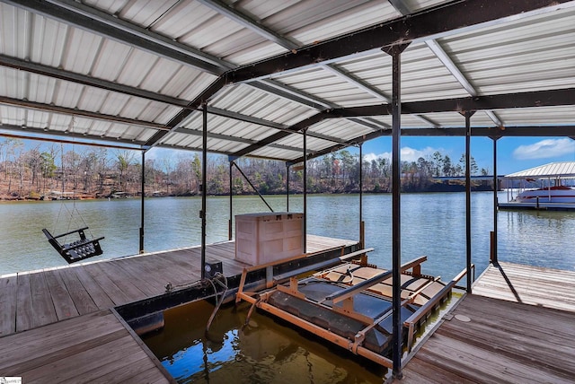 view of dock featuring a water view and boat lift