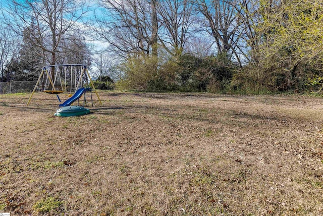 view of yard featuring a playground