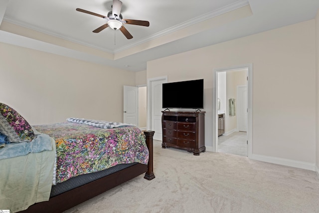 bedroom featuring baseboards, a raised ceiling, a ceiling fan, ornamental molding, and carpet flooring