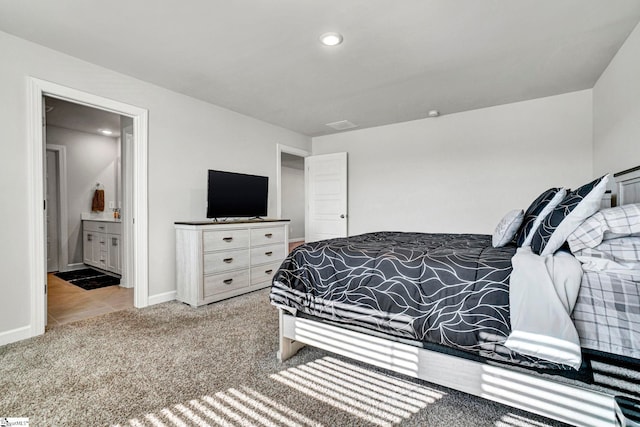 bedroom with carpet, connected bathroom, baseboards, and recessed lighting