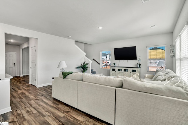 living room with stairway, baseboards, dark wood-style flooring, and recessed lighting