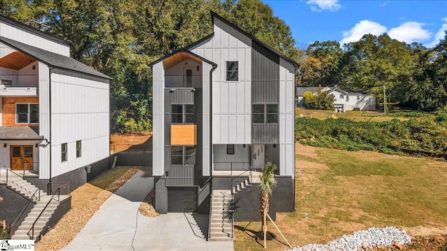 view of outdoor structure with concrete driveway