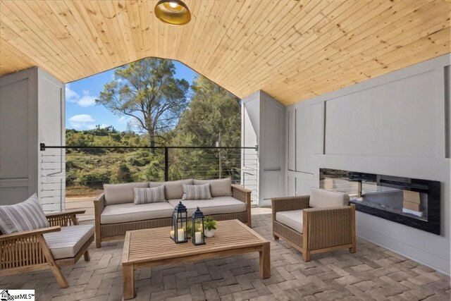 balcony featuring an outdoor hangout area and a patio area