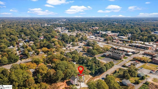 drone / aerial view with a forest view