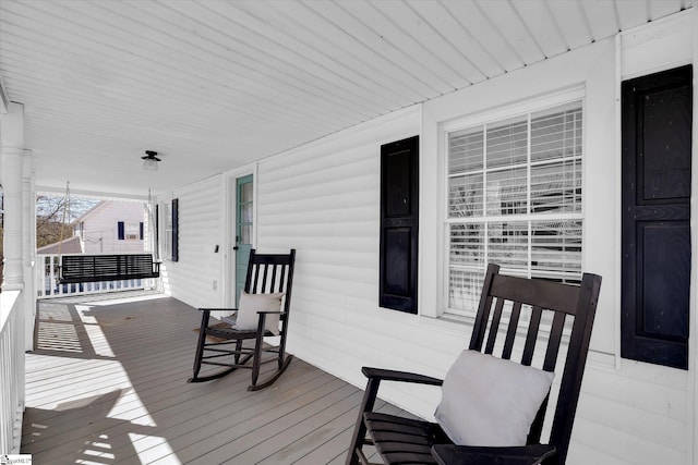 deck featuring covered porch