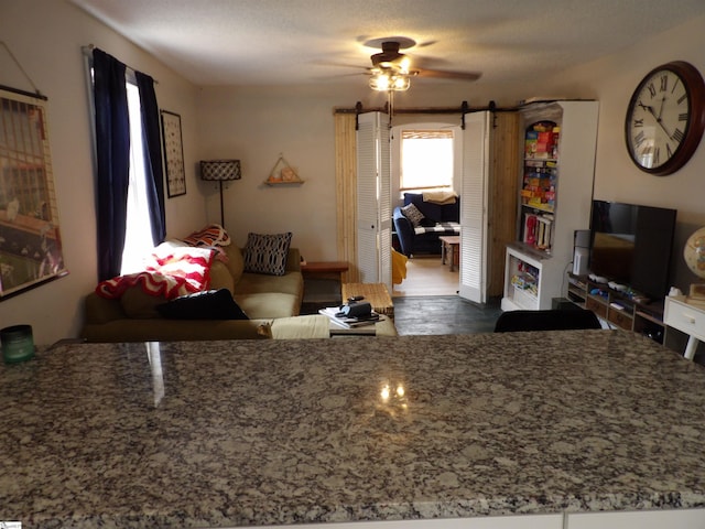 living area featuring dark wood-style floors