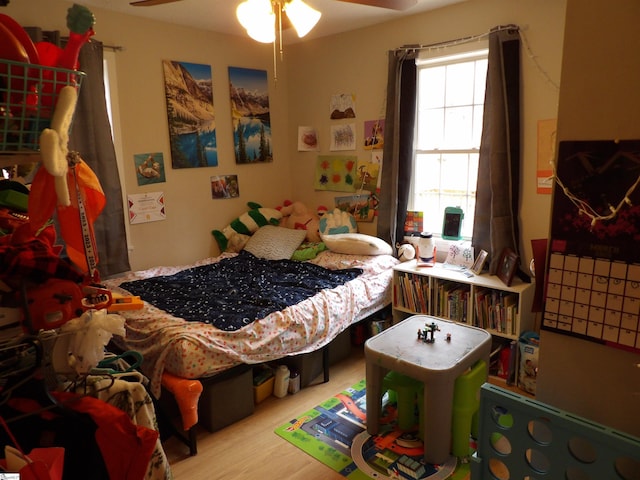 bedroom with wood finished floors