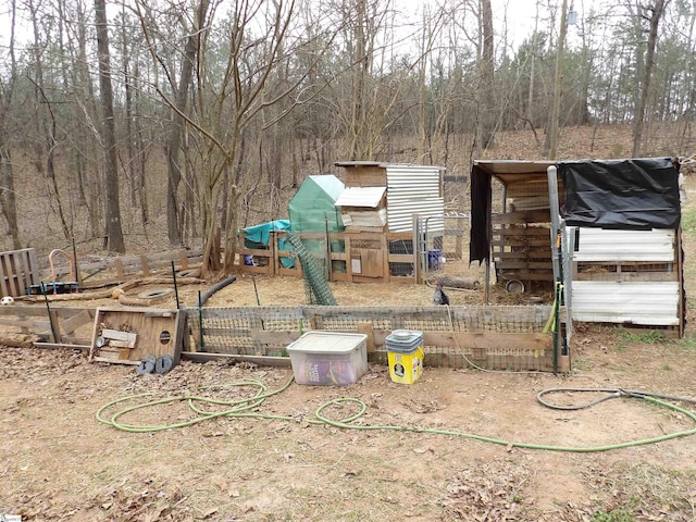 view of yard with an outdoor structure and exterior structure