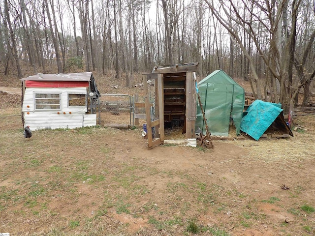 view of outbuilding featuring an outdoor structure