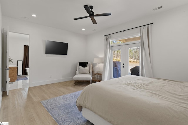 bedroom featuring access to exterior, french doors, recessed lighting, visible vents, and wood finished floors