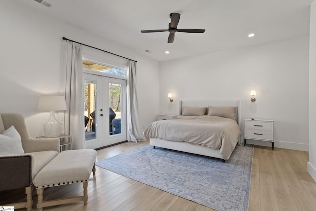 bedroom featuring access to exterior, french doors, light wood finished floors, recessed lighting, and baseboards