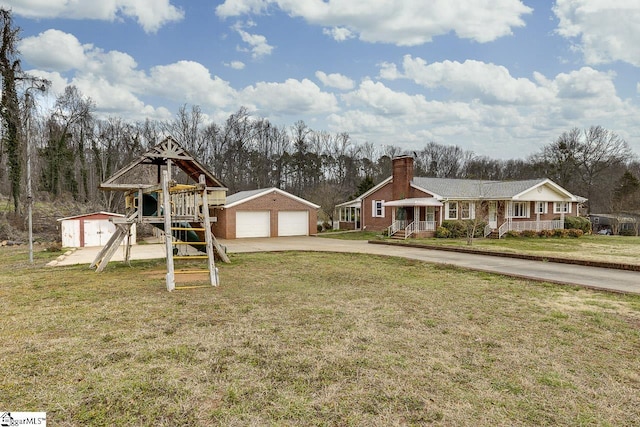 exterior space with a yard and an outdoor structure